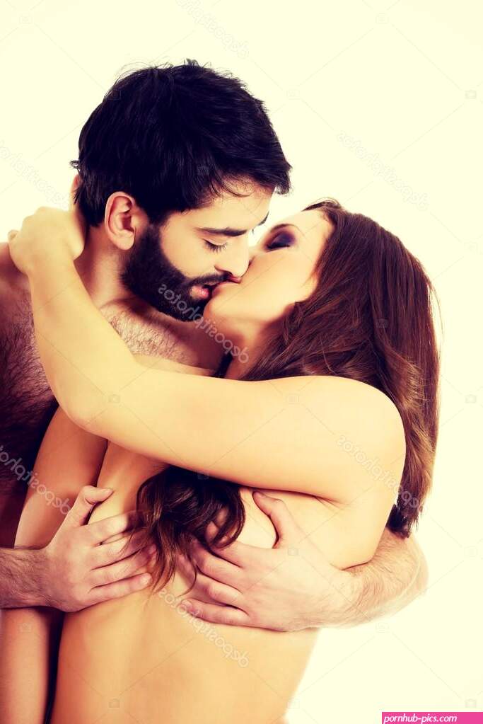 Sexy heterosexual couple kissing. Stock Photo by piotrmarcinski 85856826