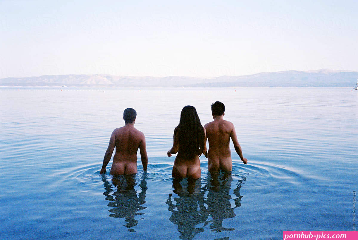 Three Naked Friends In The Sea During Morning by Stocksy Contributor Marija Mandic