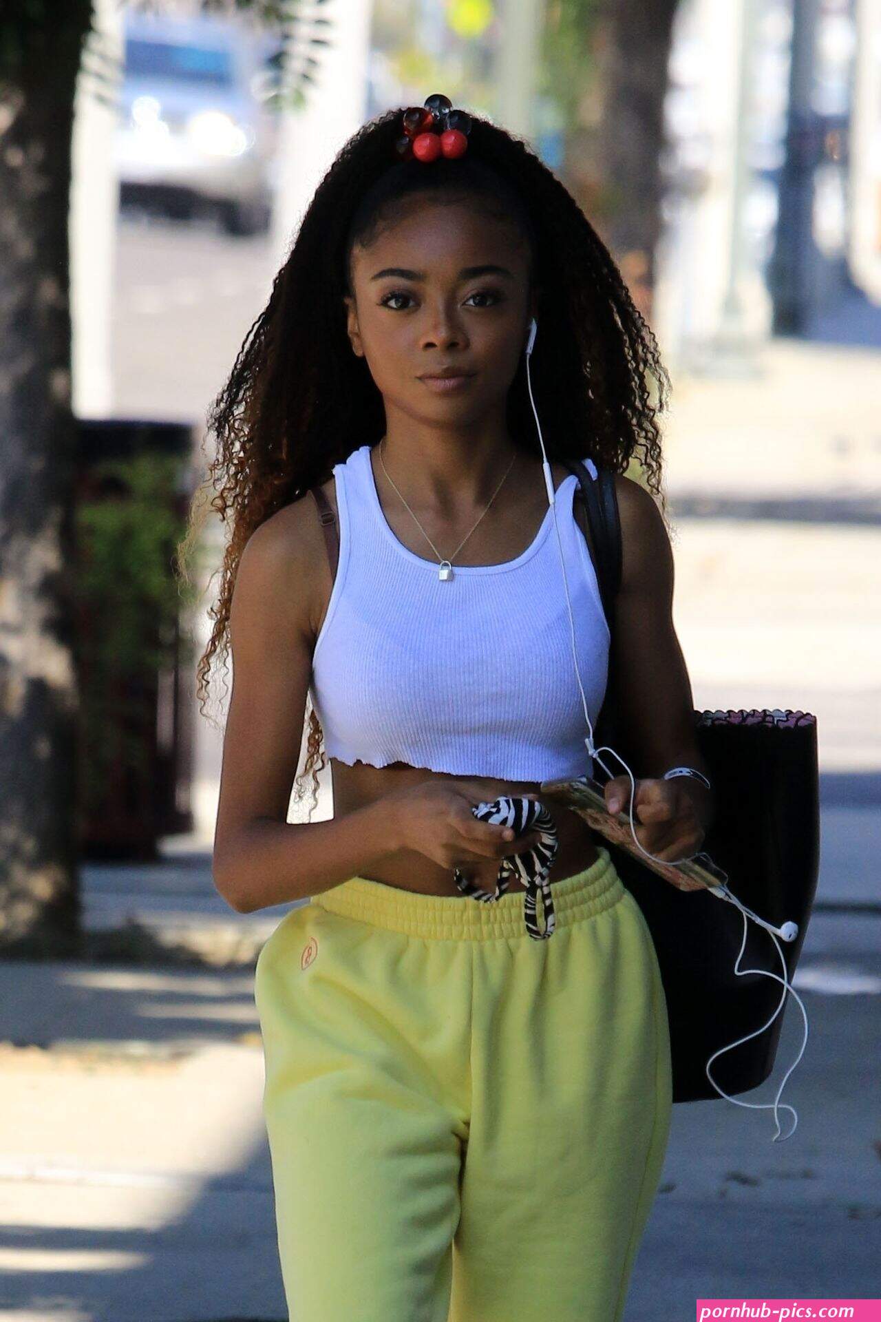 Skai Jackson Walks in With a Matching Postmates Delivery Cart