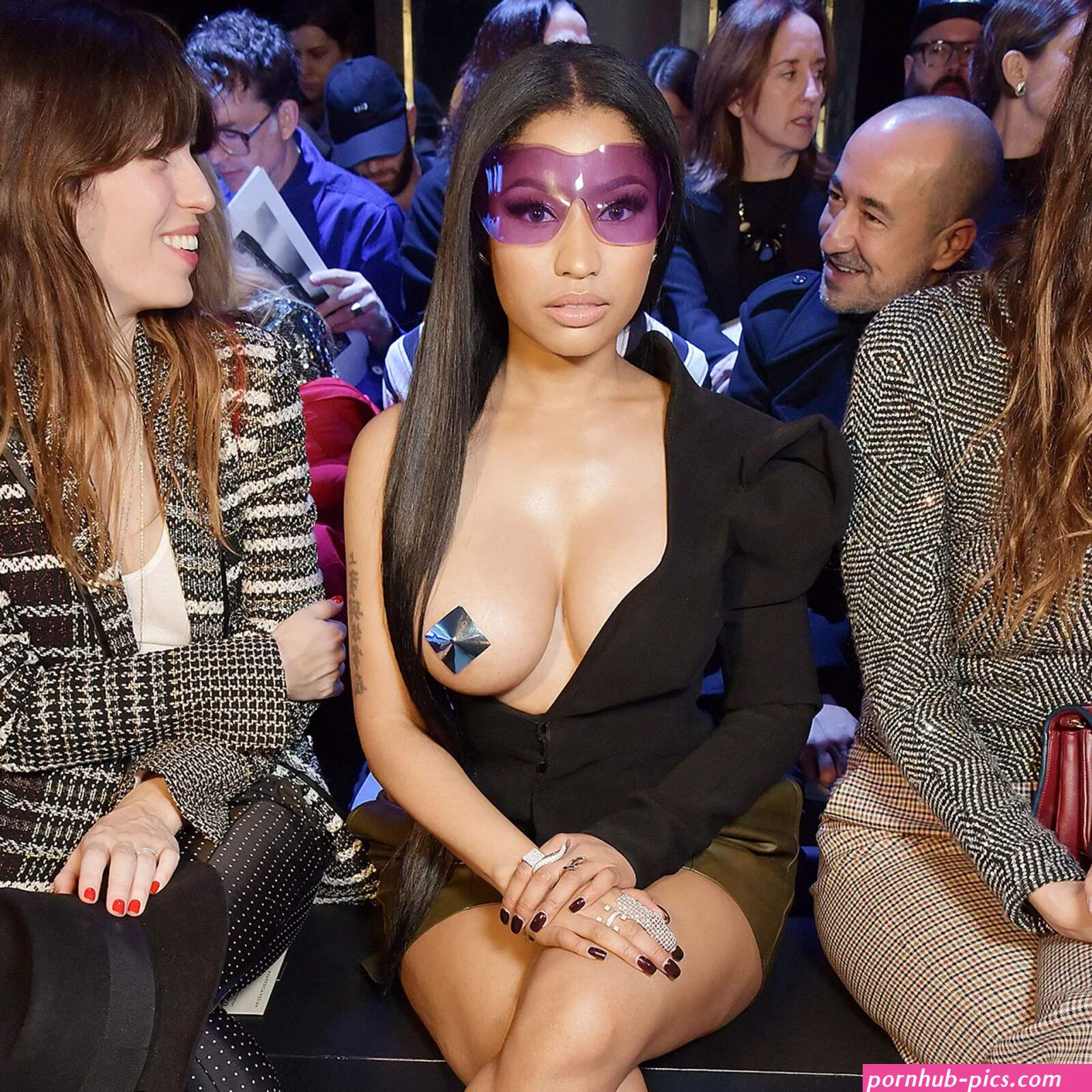 Nicki Minaj boob out at Paris Fashion Week reactions