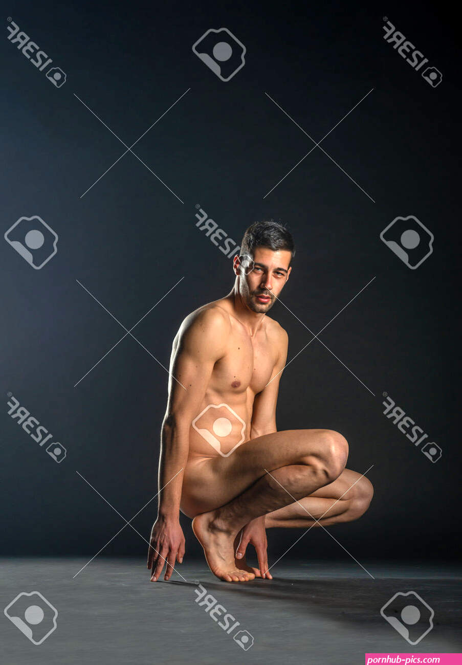 Portrait Of A Naked Male Model Posing Squatted On Black Studio Background Stock Photo Picture and Royalty Free Image. Image 181251580.