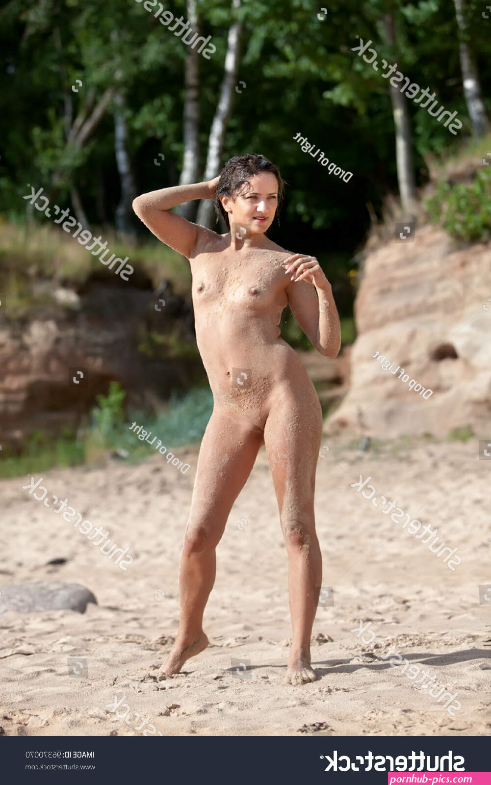 Young Nude Woman Posing On Nature Stock Photo 96370070