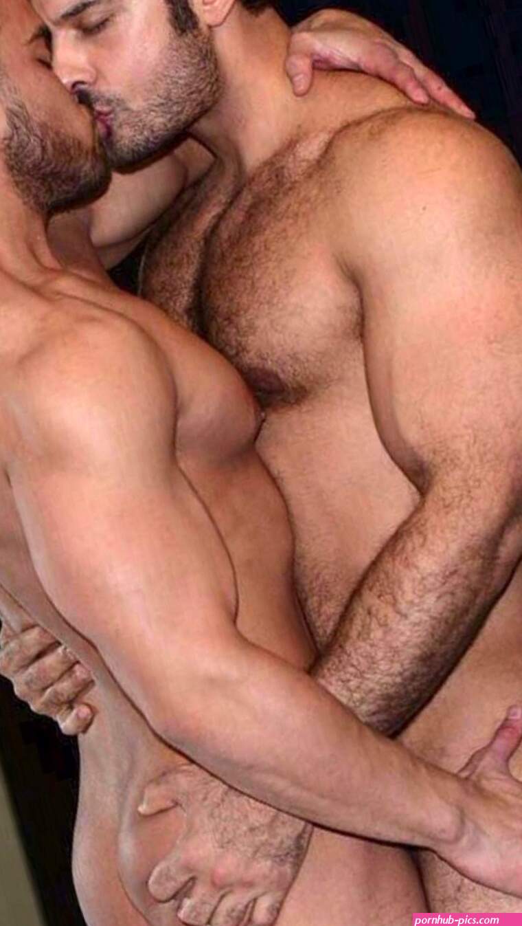 Naked men hug