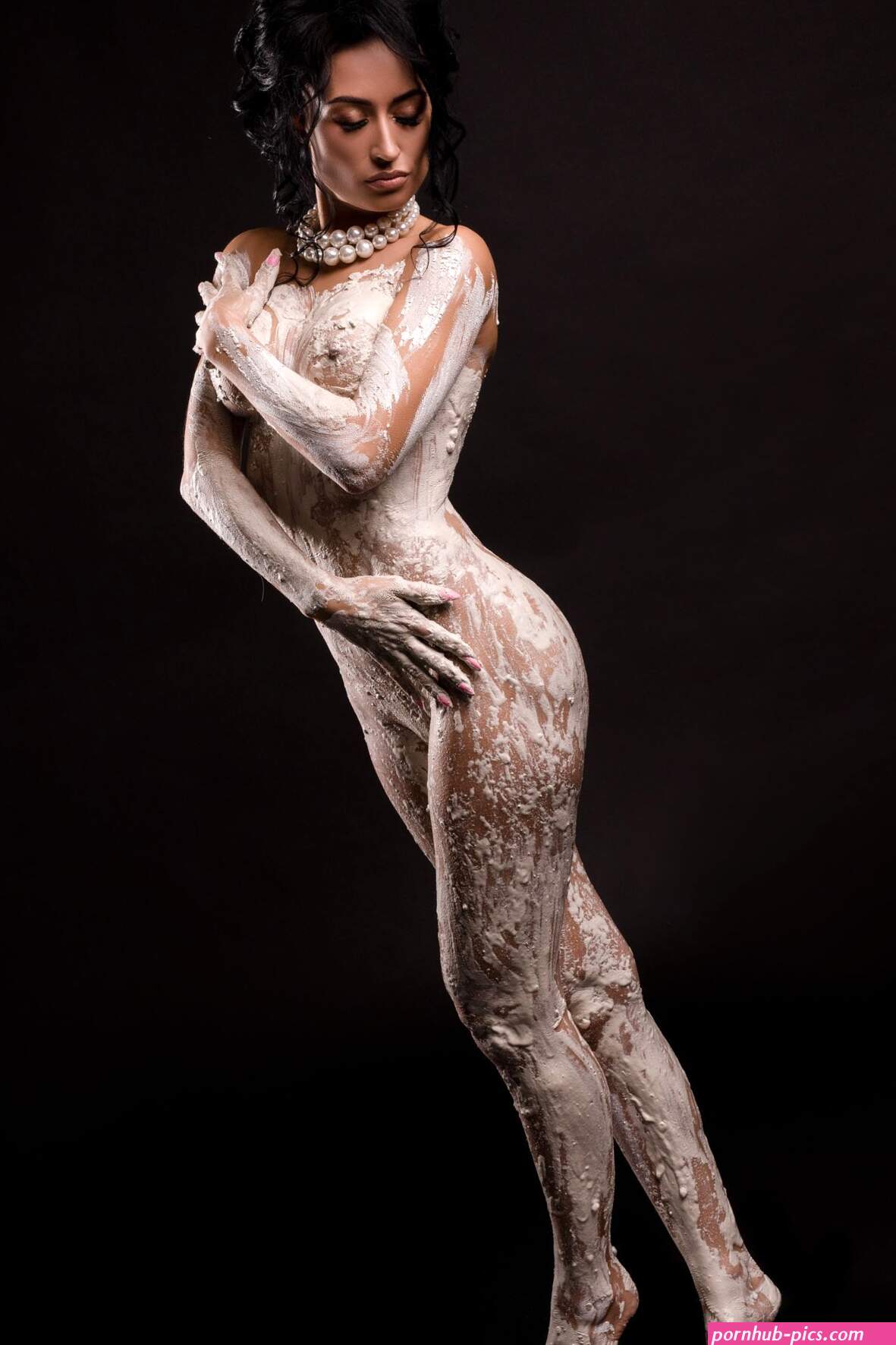 Pretty topless woman in gypsum bodyart. Photographer Andrey Guryanov