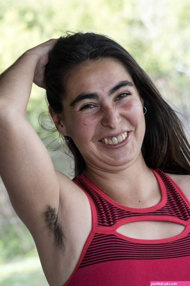 Hairy American Paris unveils her curvy body and super furry pussy outside