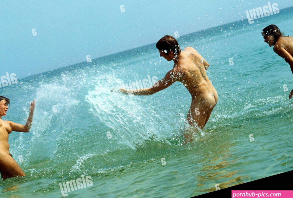 Bathing fun on the Baltic Sea Nudist beach Prerow on the Darss Stock Photo