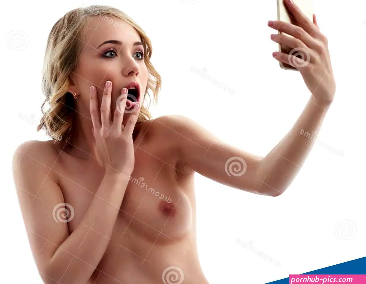 Naked Woman Taking a Selfie with Her Smart Phone Stock Photo