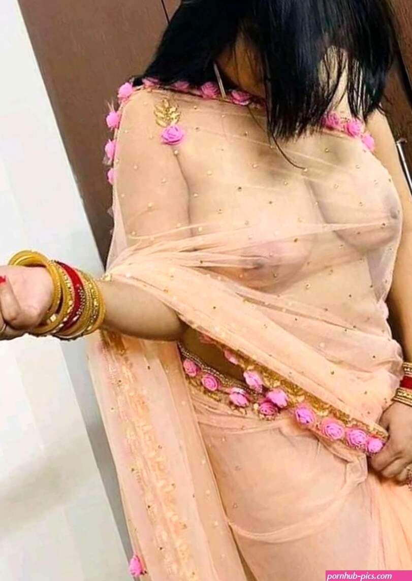 Desi milf showing her huge titties in her transparent saree without any bra or blouse