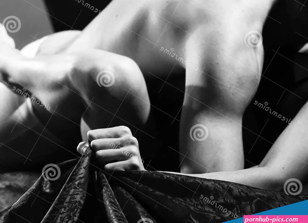 Hand Squeeze Bedclothes. Naked Lovers Passionate Sex. Woman Embrace Lover by Legs Stock Image