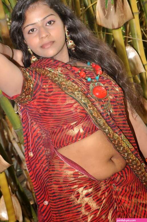 Mallu aunties: tamil busty aunty hot red saree pallu drop exposing deep navel sexy boob shape side view in spicy blouse latest bulging stills
