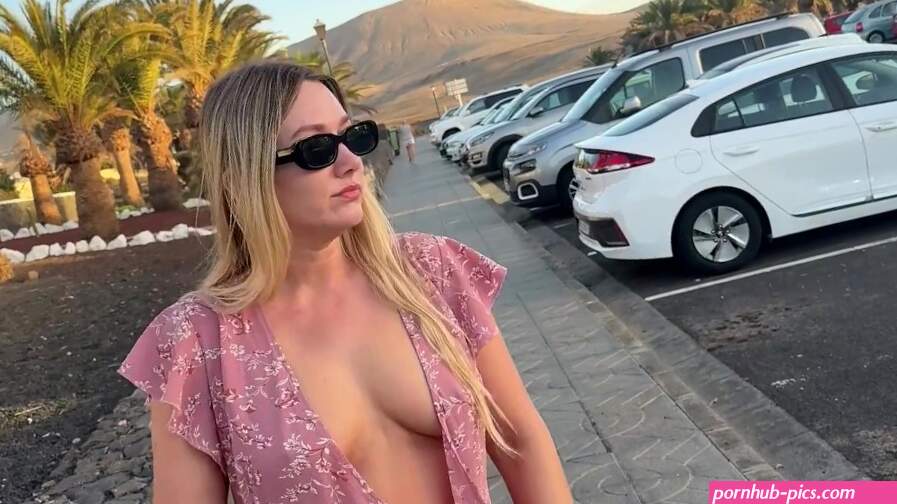 girl walks down the street without panties and bra in public