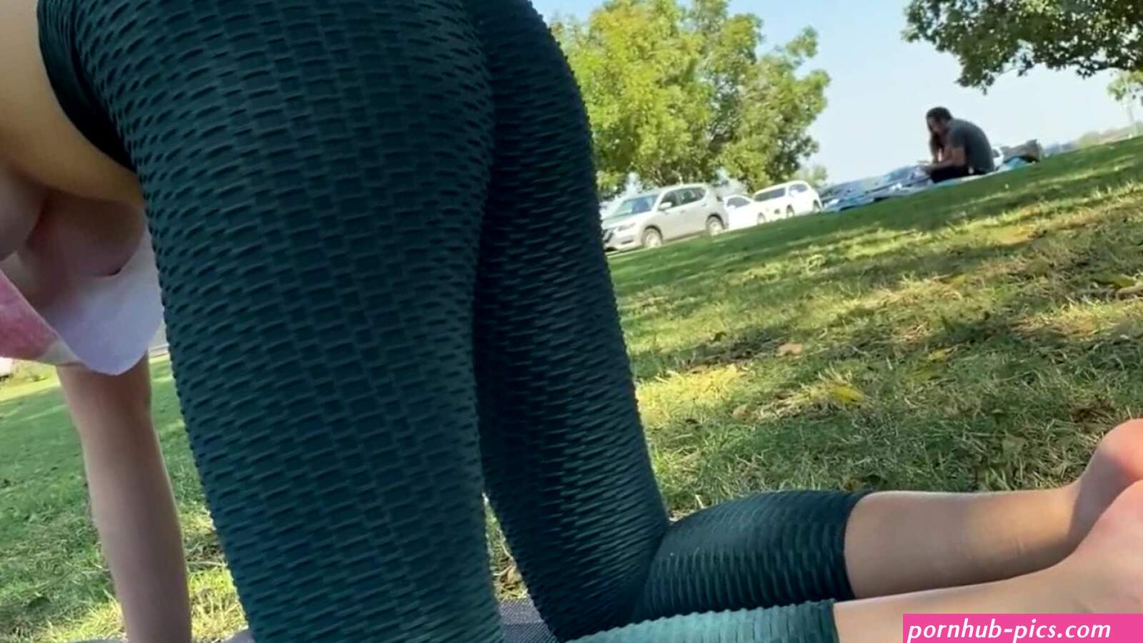 Voyeur doing yoga in public with loose top and no bra