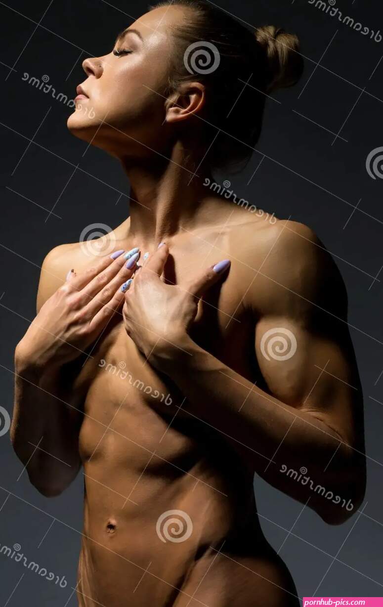 Nude Athletic Woman Standing and Cover Breast by Hands Stock Image