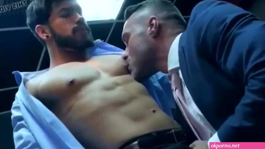 Elegant hunk wears slick blue suit while ramming hot stud