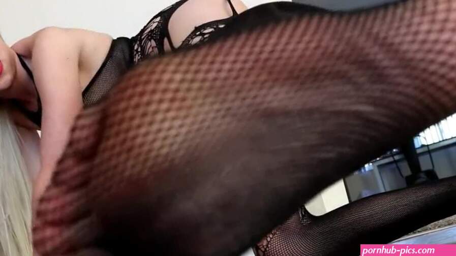 Foot fetish goddess Jessica Jones posing in her black see through lingerie