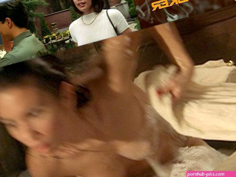 Lexa Doig naked in a bathtub at The Tracker