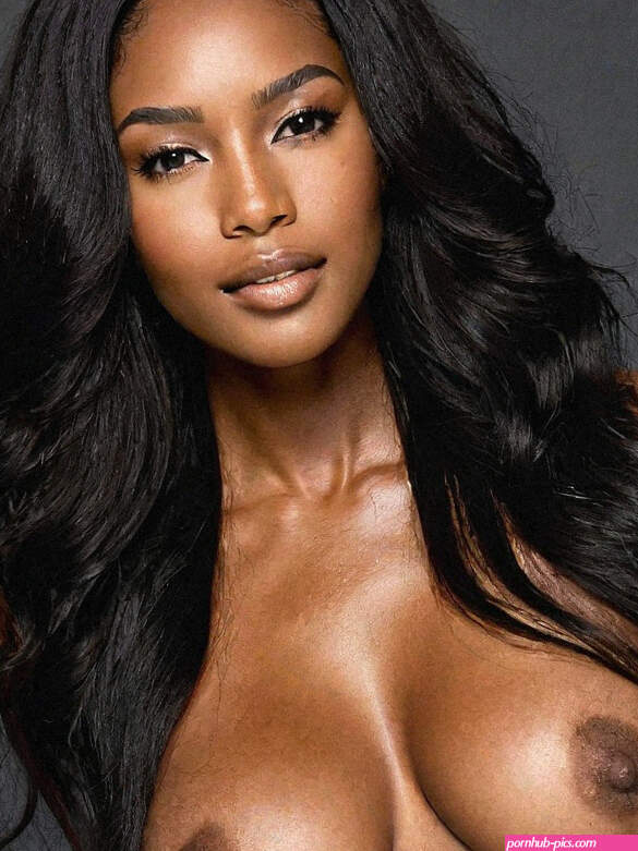 Black ebony slim 20s model with big round breasts long black hair horny expression and jumping pose cumshot and makeup