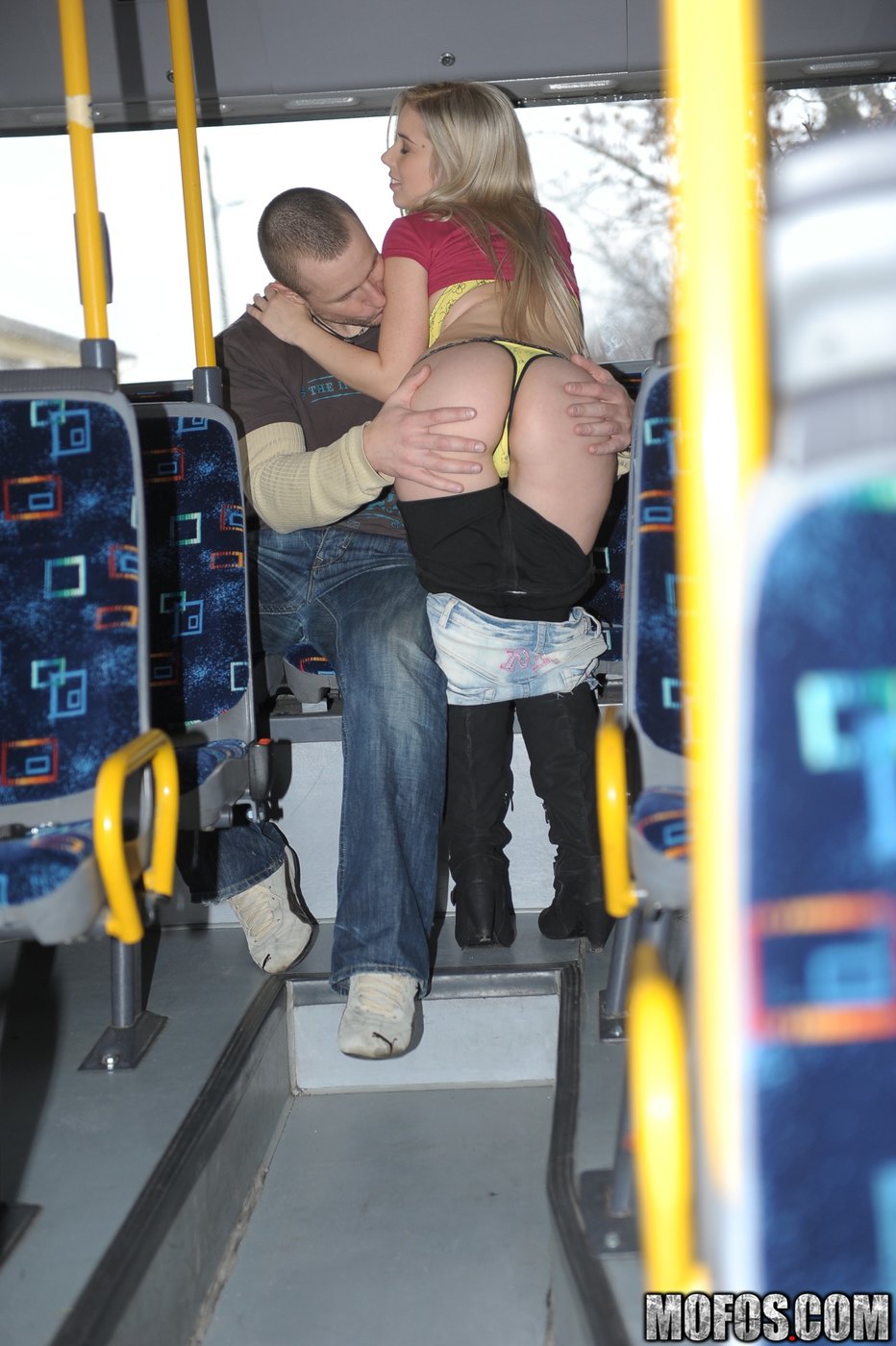 Skirt-wearing blonde with perky tits gets fucked on a public bus