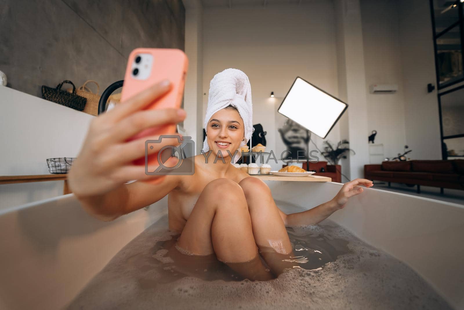 Brunette doing her sexy photo while taking bath by teksomolika Vectors Illustrations with Unlimited Downloads