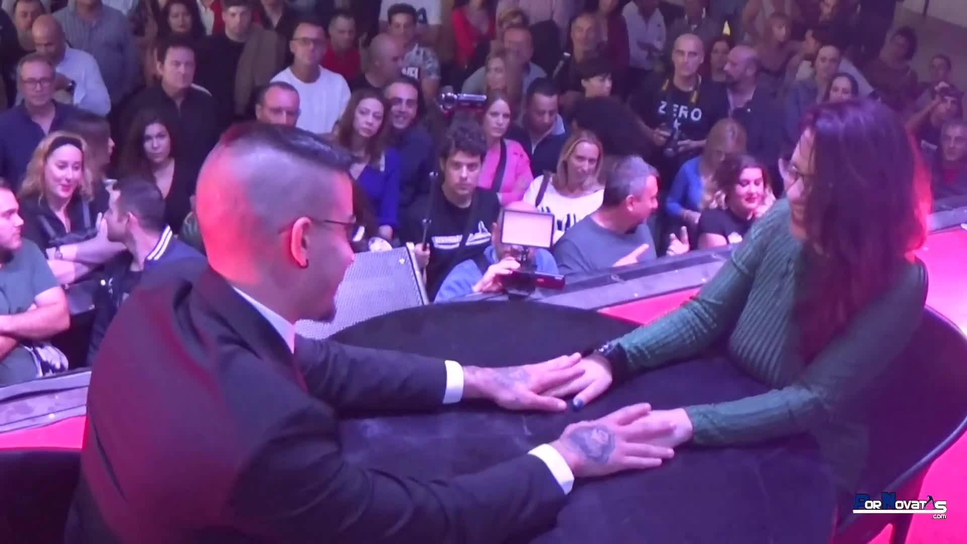 Porn show in public with a big tits slut who gets some pussy fingering and then gets down on her knees and gives mouthwatering blowjobs in front of tons of excited people
