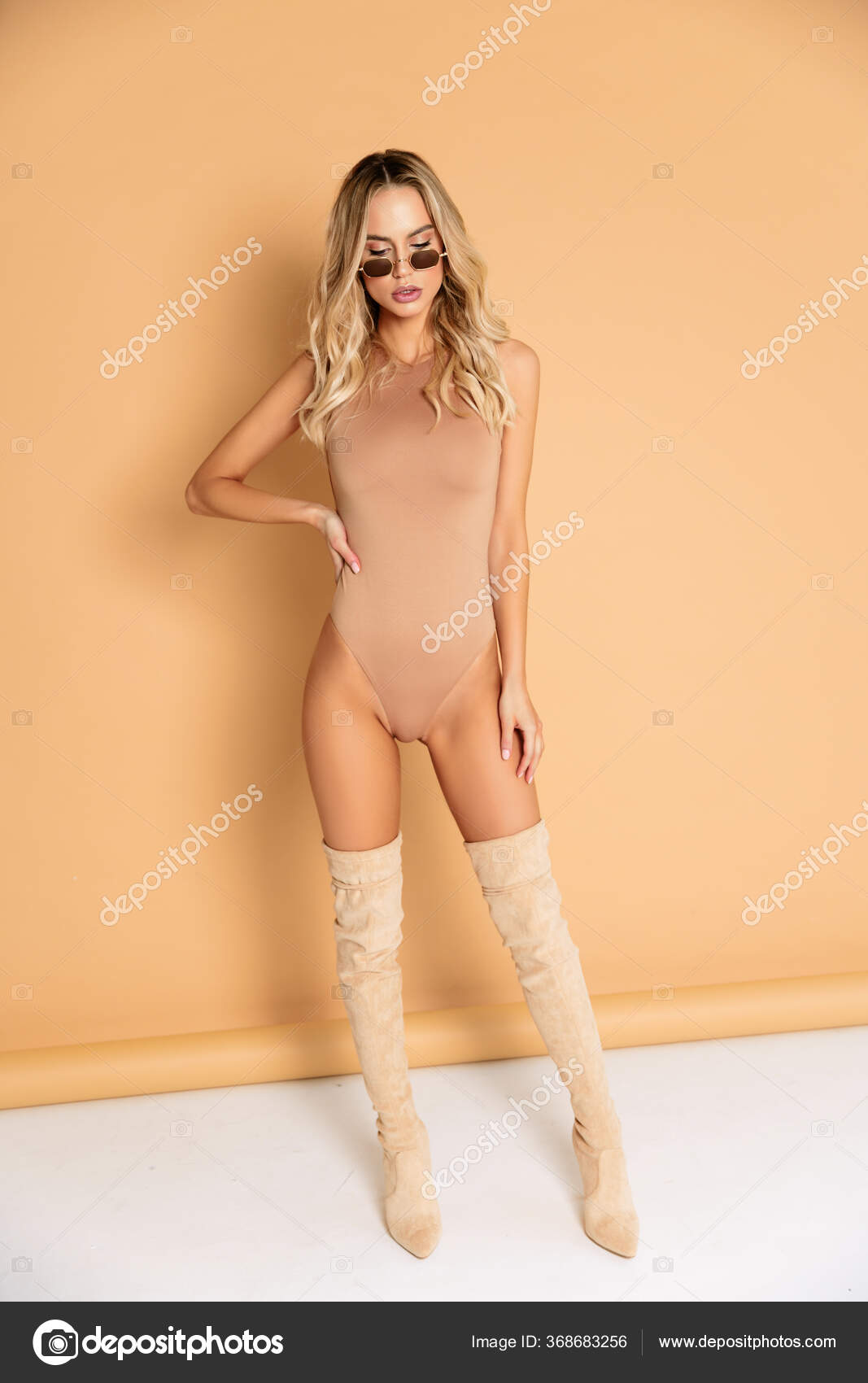 Sexy Blonde Model Perfect Skinny Body Huge Boobs Posing Beige Stock Photo evgennish 368683256