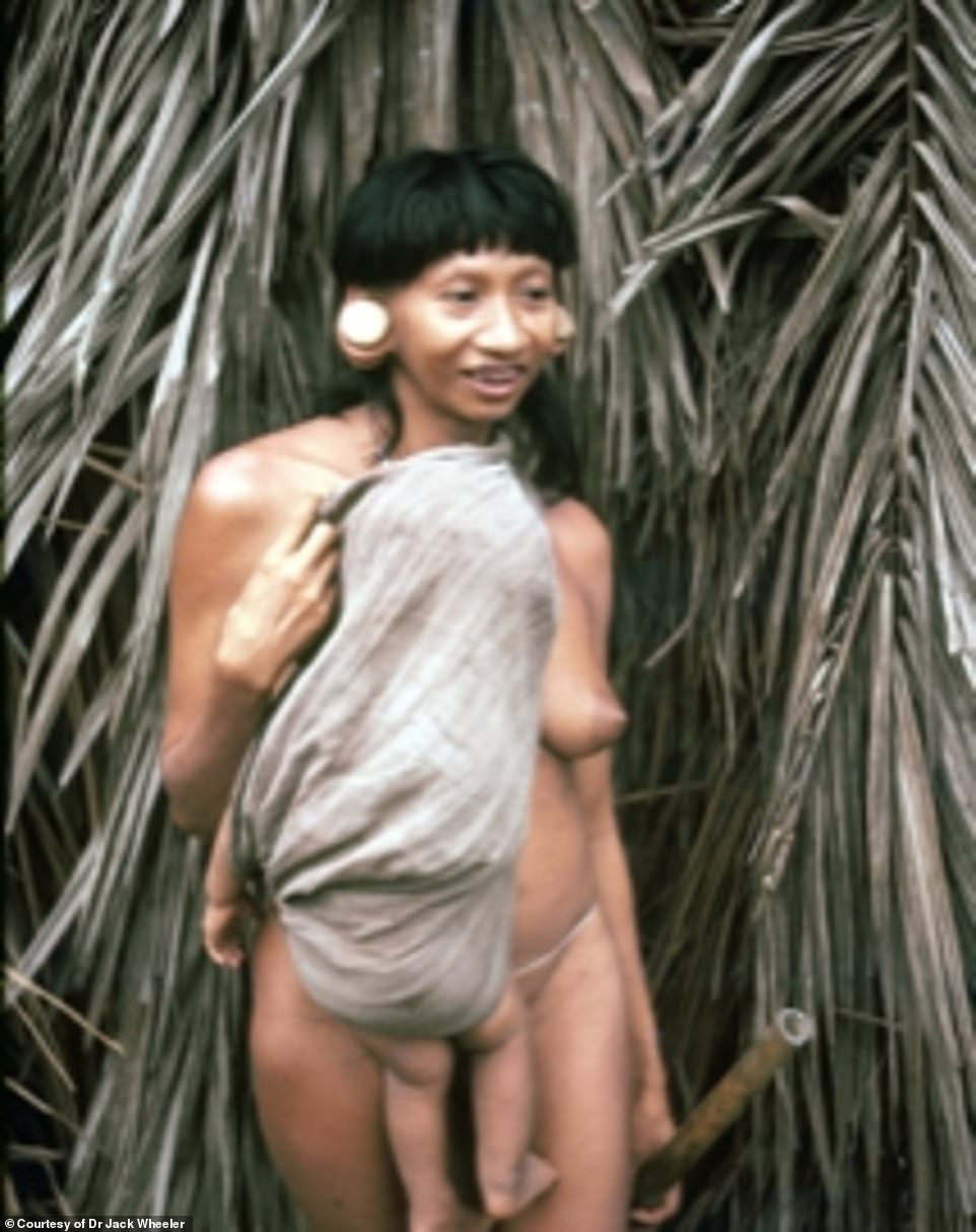 Explorer unearths photos showing Amazonian tribe making contact with outside world for first time