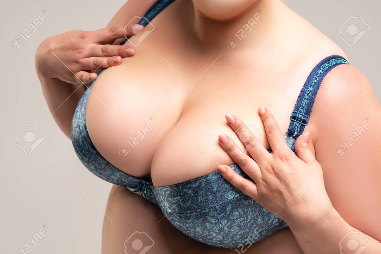 Big Natural Breasts In Blue Bra Close-up Biggest Boobs On Gray Background Studio Shot Stock Photo Picture and Royalty Free Image. Image 157654411.