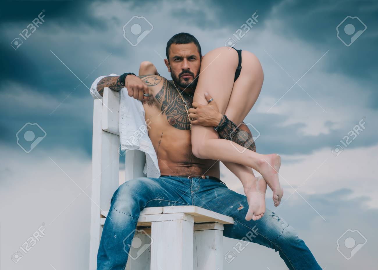 Male Perfume For Really Man. Crazy Sex. Beautiful Lady And Latinos Man In Erotic Pose On Sky Background. Stock Photo Picture and Royalty Free Image. Image 110836256.