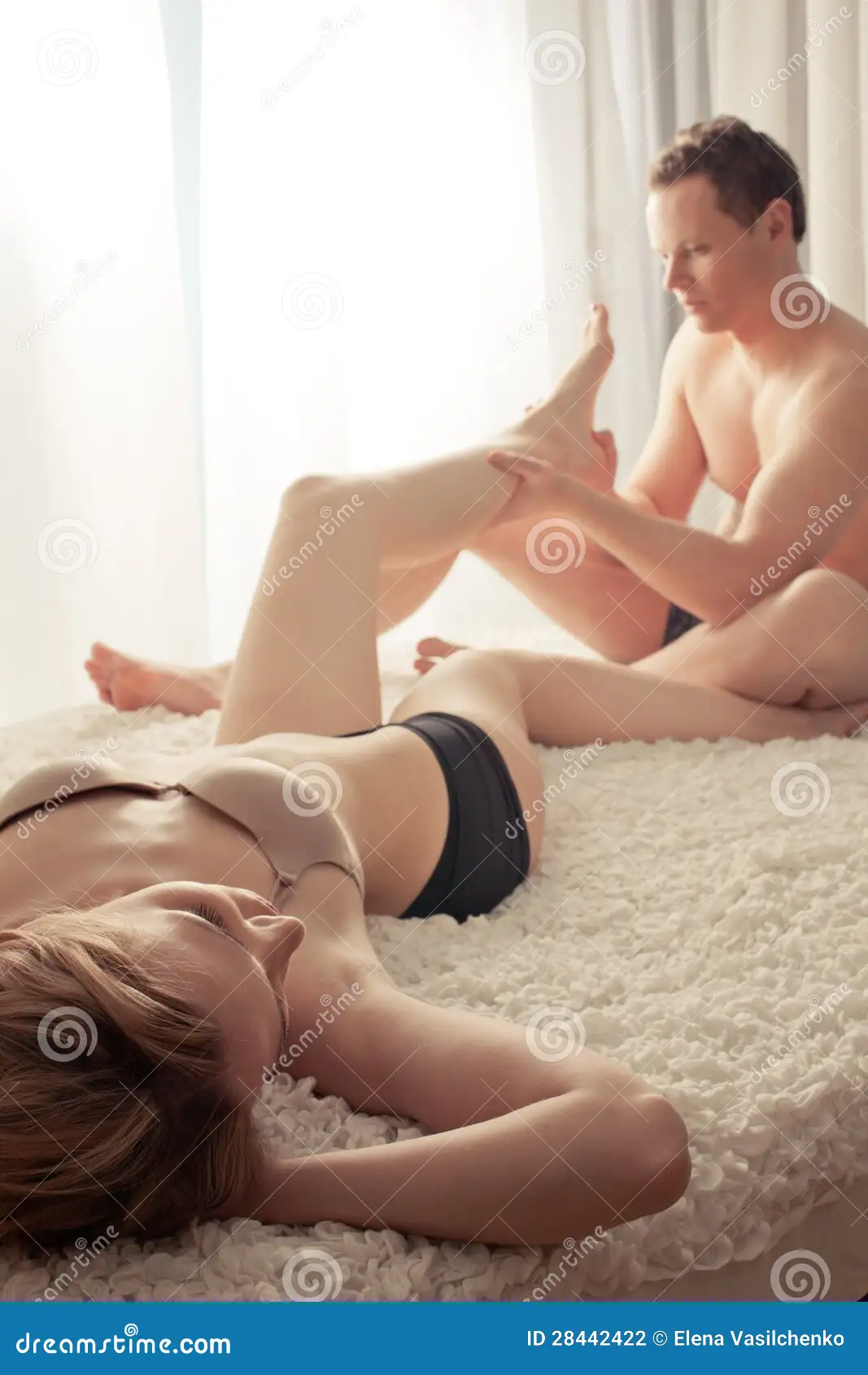 Young Man Makong Massage His Girl in Bed