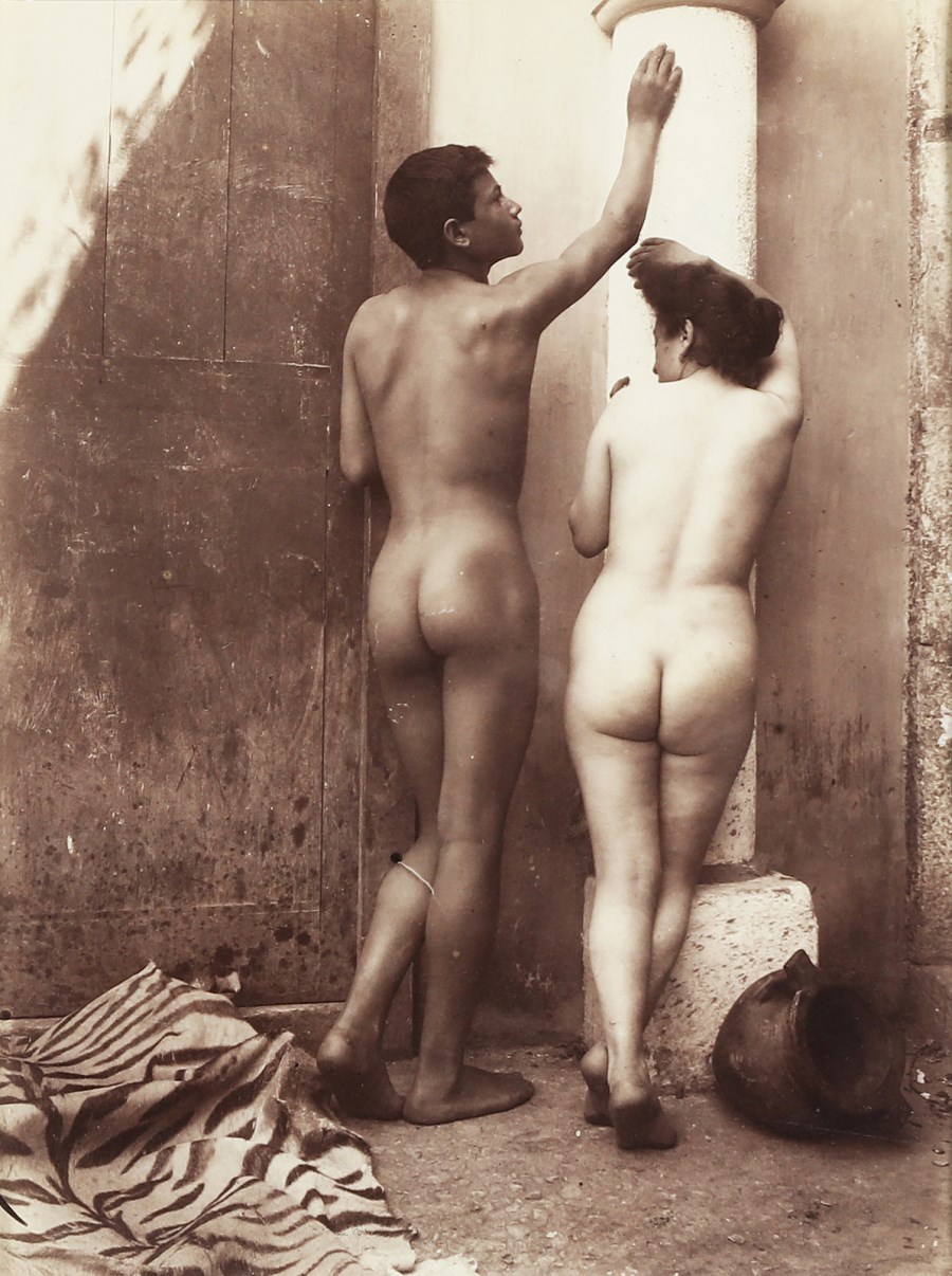 Two nudes from the back.