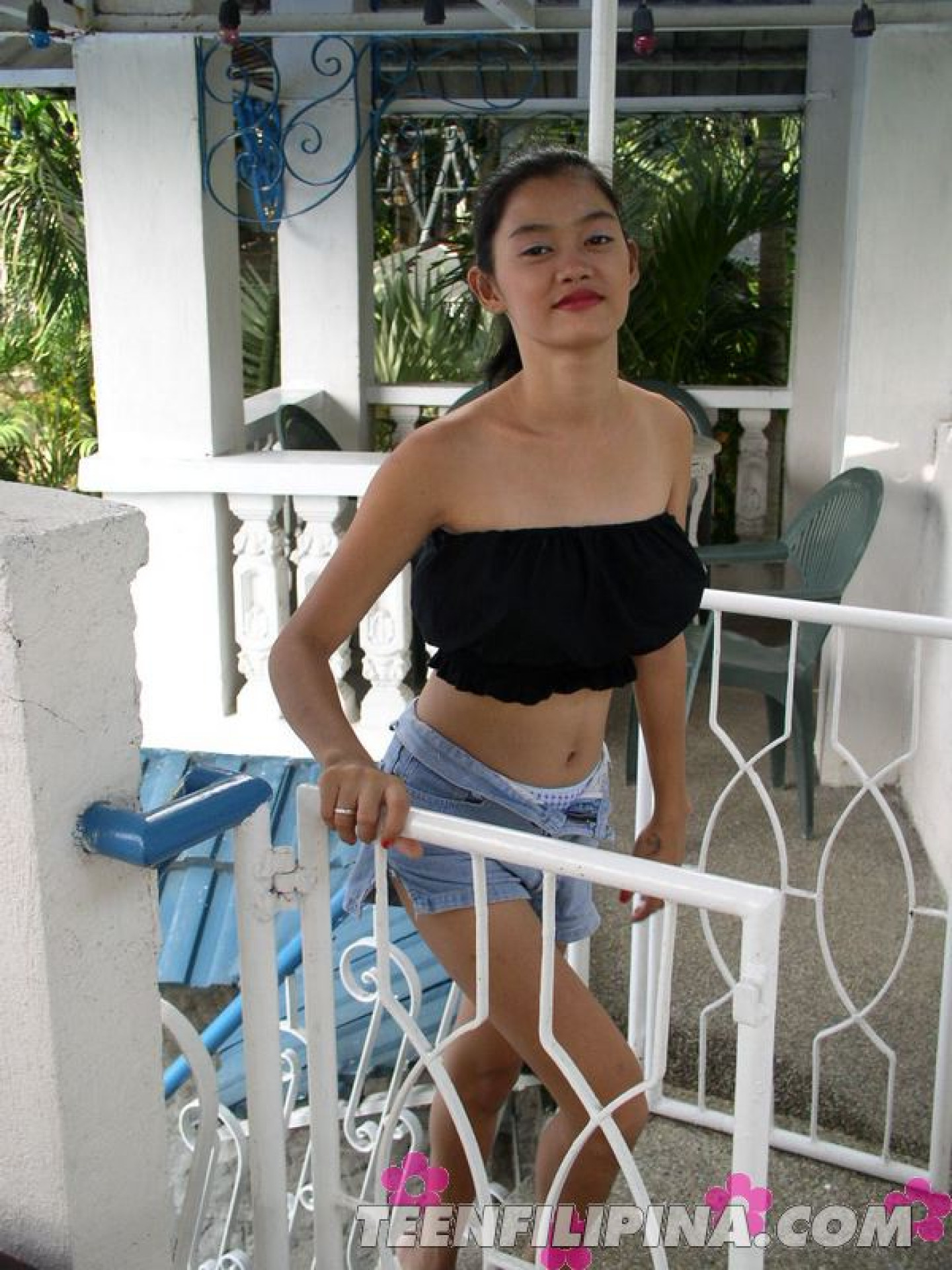 Busty Filipina teen Alma Chua has sex with her man friend on a covered patio