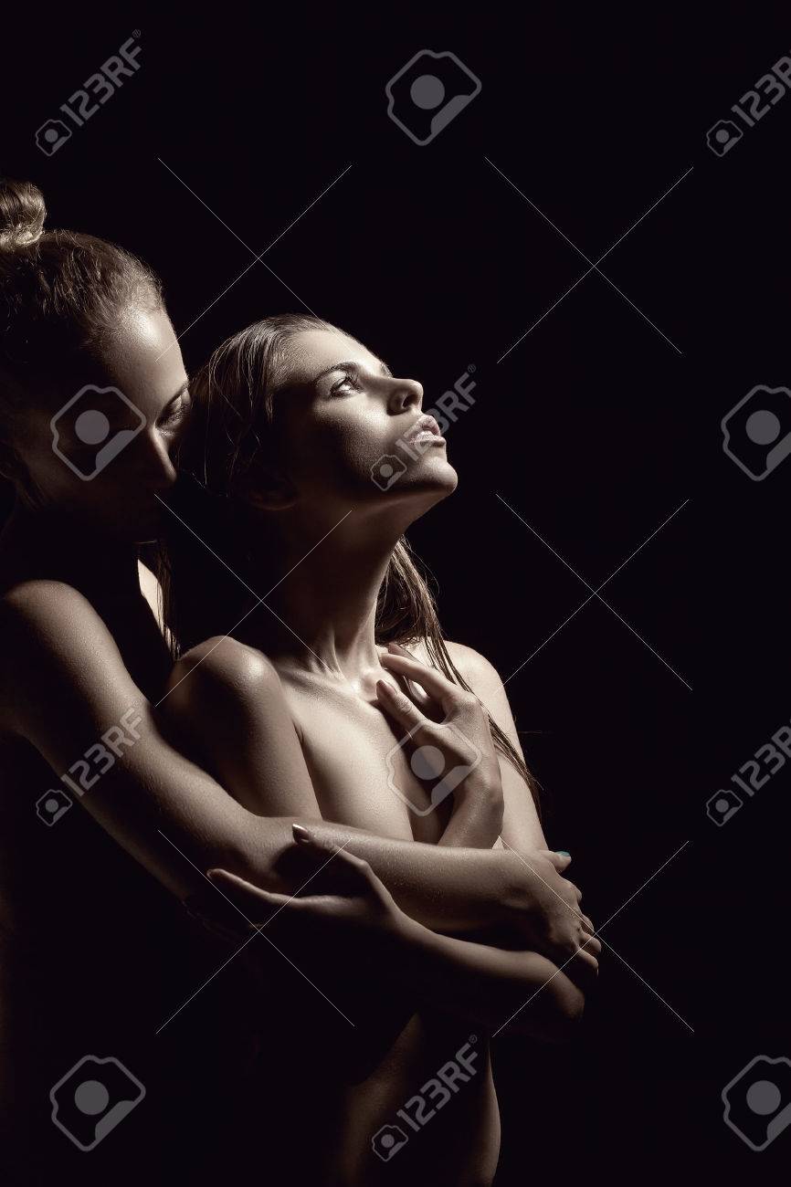 Two Beautiful Sexy Lesbian Women In Erotic Foreplay Game On Dark Background -. Image 37260514