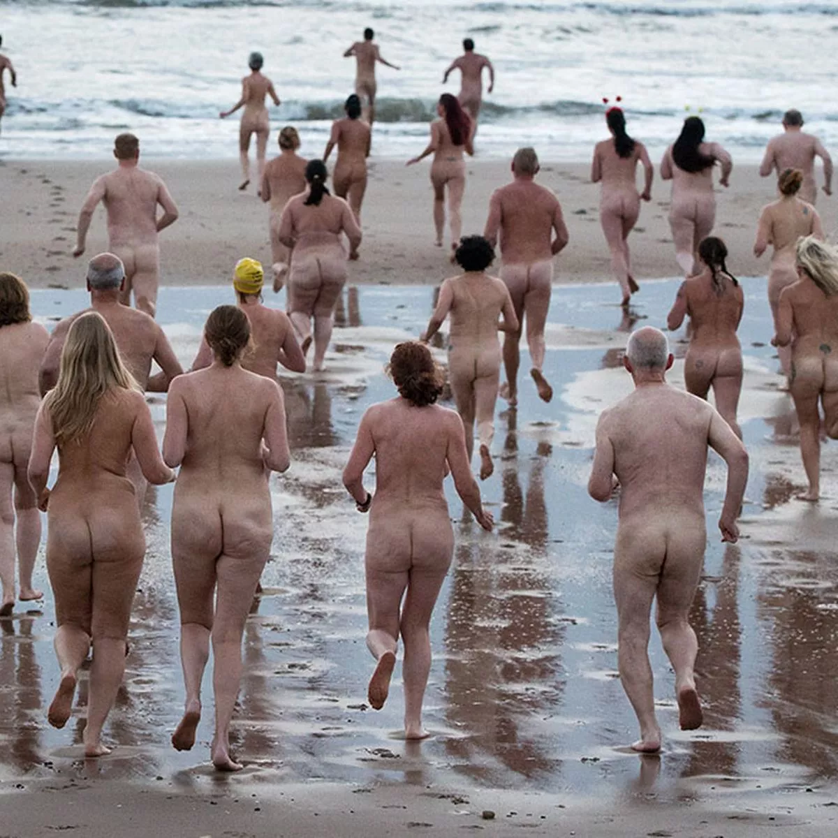 Naked swimmers brave freezing temperatures in world record skinny dip attempt