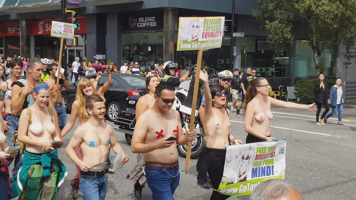 WARNING: Nude photos and video of women marching in Go Topless parade