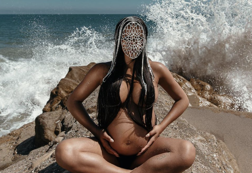 Cassie shows off her baby bump in birthday photo