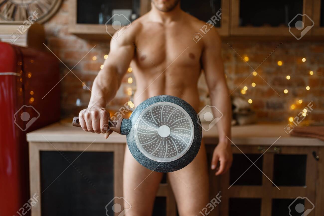 Nude Man Covered With A Pan Cooking On Kitchen Stock Photo Picture and Royalty Free Image. Image 133535387.