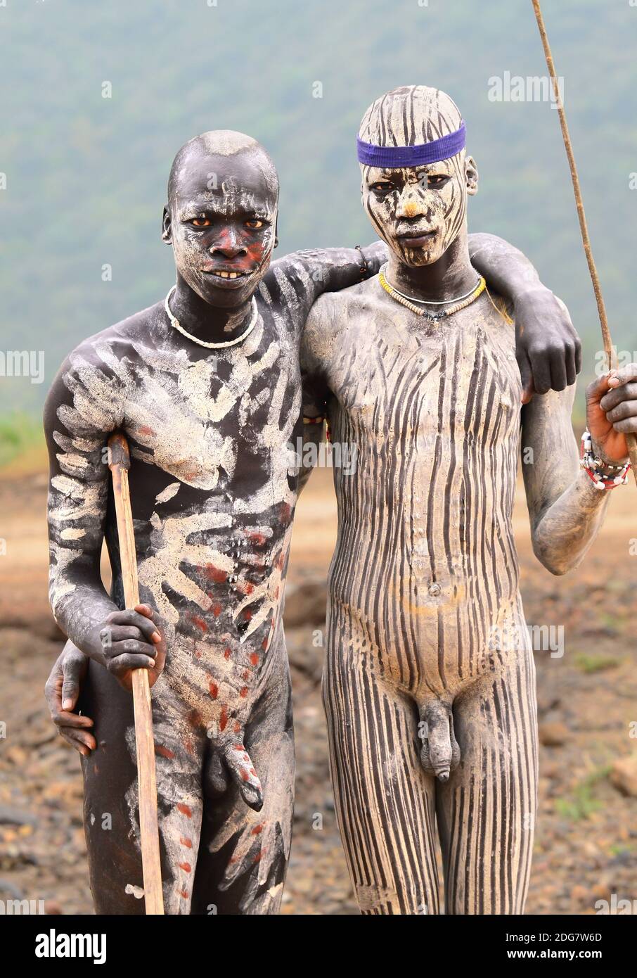 Two Mursi man Omo valley Ethiopia Stock Photo