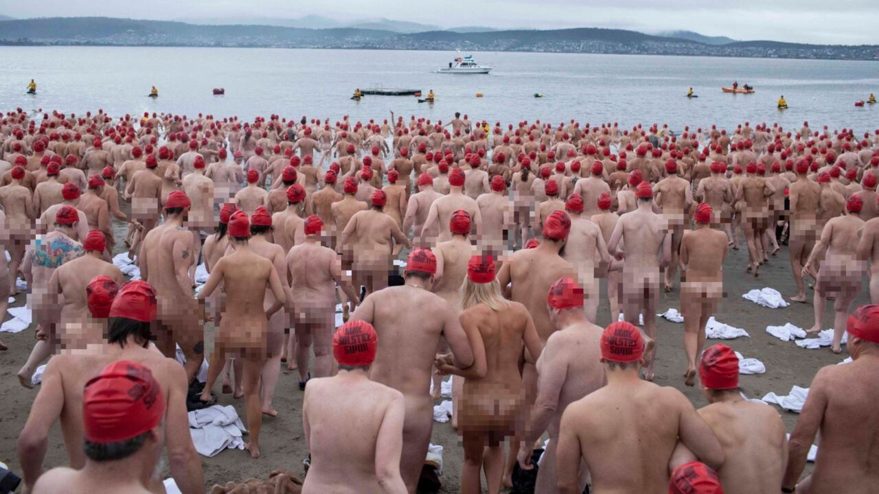 Record-breaking numbers strip off for Dark Mofo nude swim
