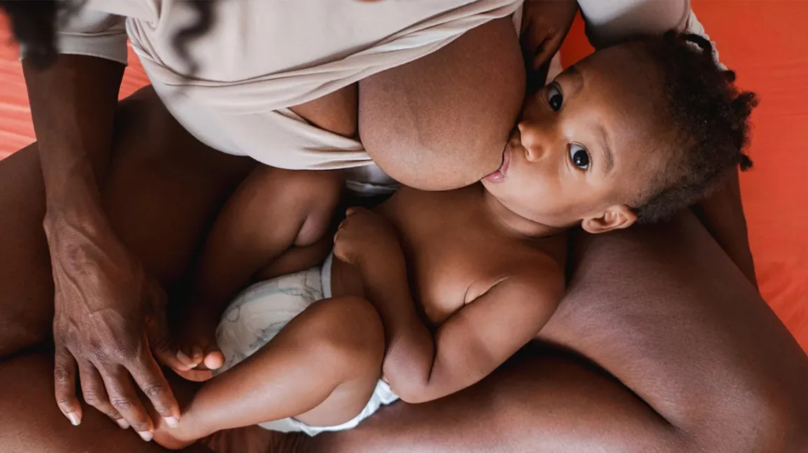 Breastfeeding with Big Boobs: Concerns Holds and Tips