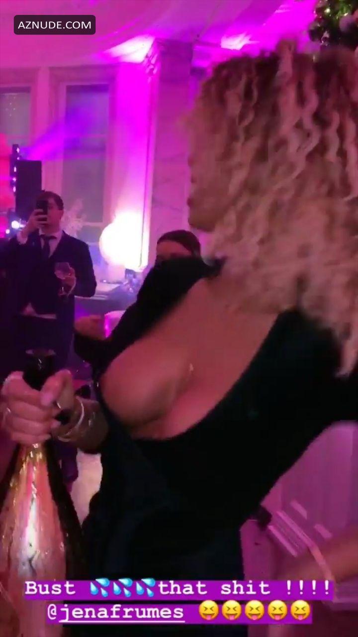 Jena Frumes shows off her cleavage at the party