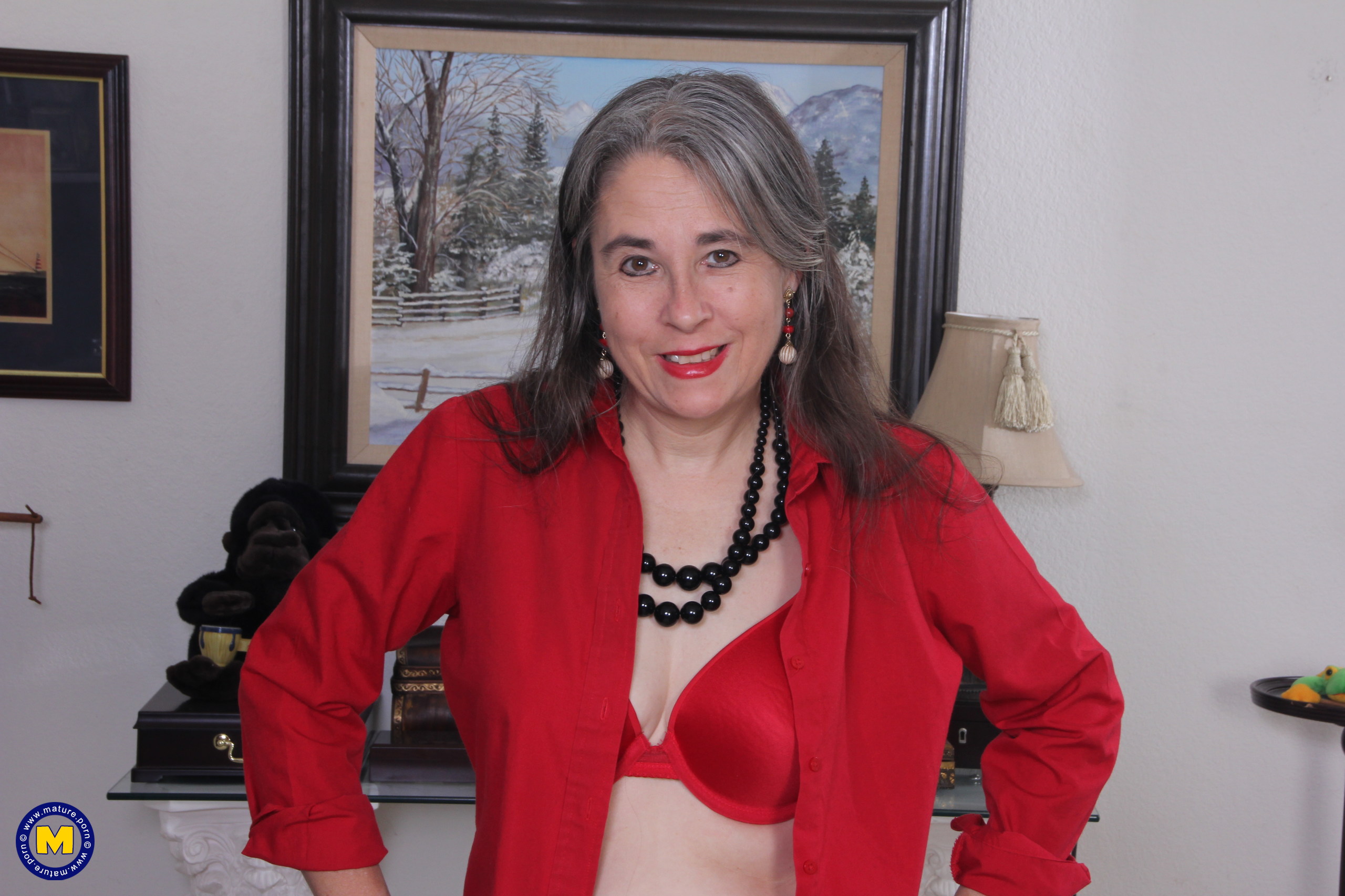 Sexy grandma with gray hair showing her naked body
