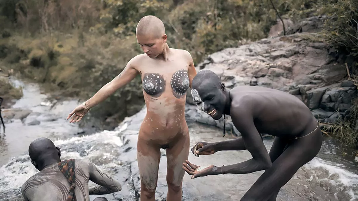 Nude model jailed for Egyptian temple outrage walks naked with remote Ethiopian tribe