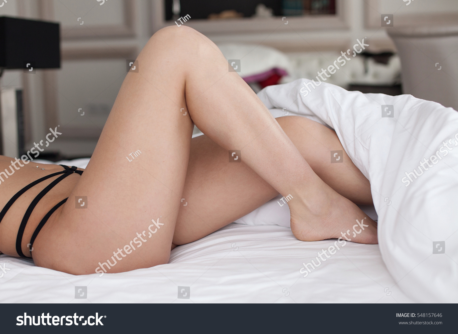 Sexy Woman Legs On Bed White Stock Photo 548157646