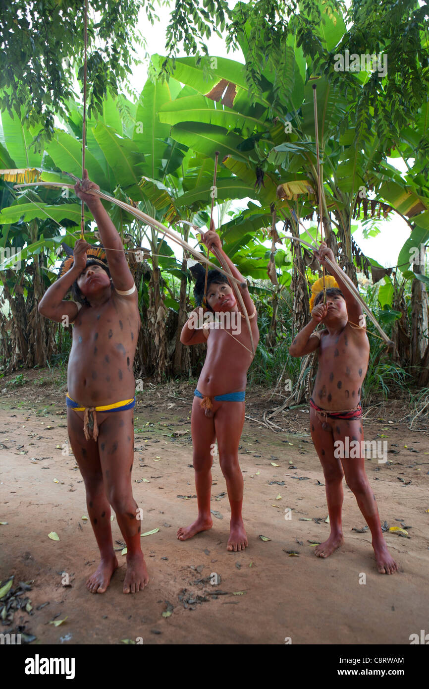 Xingu indians hunting in the Amazone Brazil Stock Photo