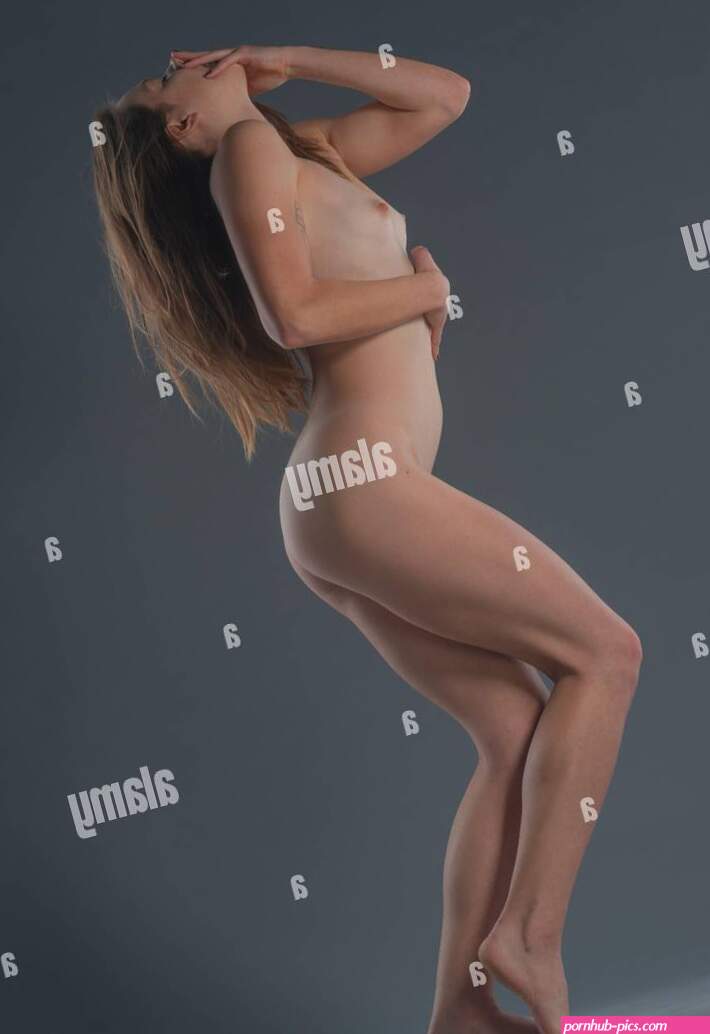 Naked body of young sexy woman with beautiful figure. art photosession with colorfull bright light on nude model. Erotic modern portraits of sensualit Stock Photo