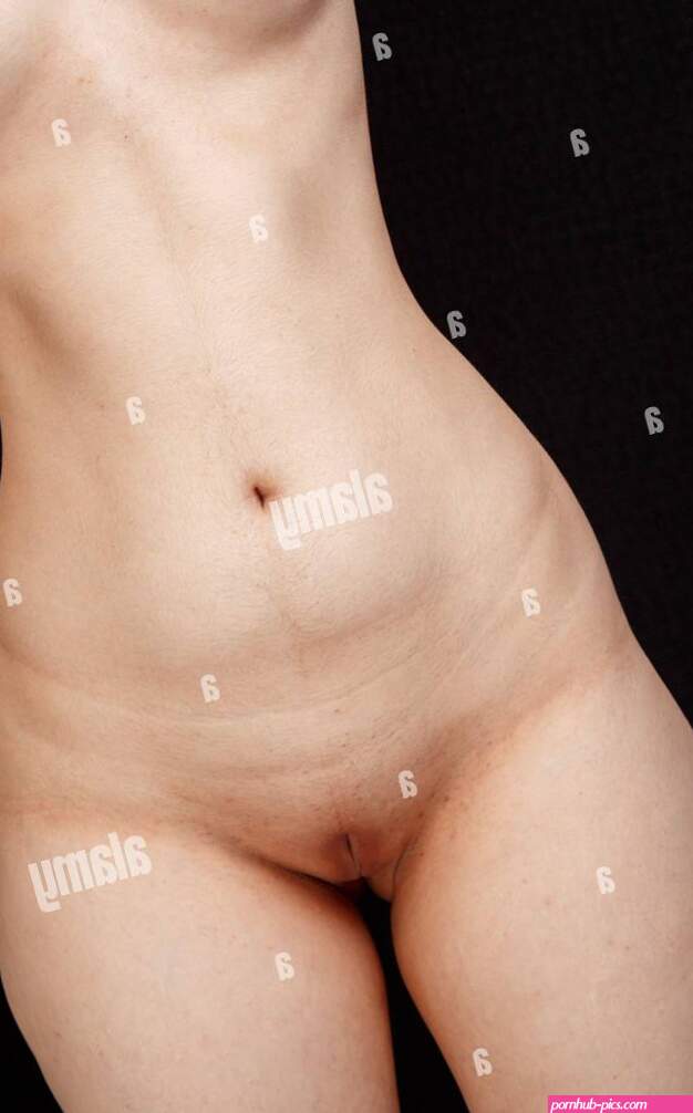 the naked body of a young 20-year-old girl with small breastslarge nipples and wide hips. on an isolated background Stock Photo
