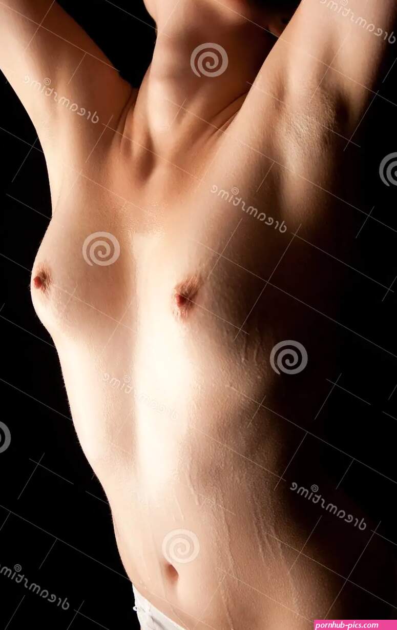 Semi-nude Wet Torso of a Young Woman Stock Photo