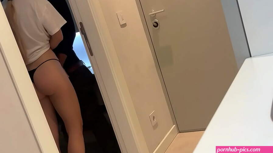 The hot wife gave a blowjob to the courier and her husband watched in the next room. Cuckolds.