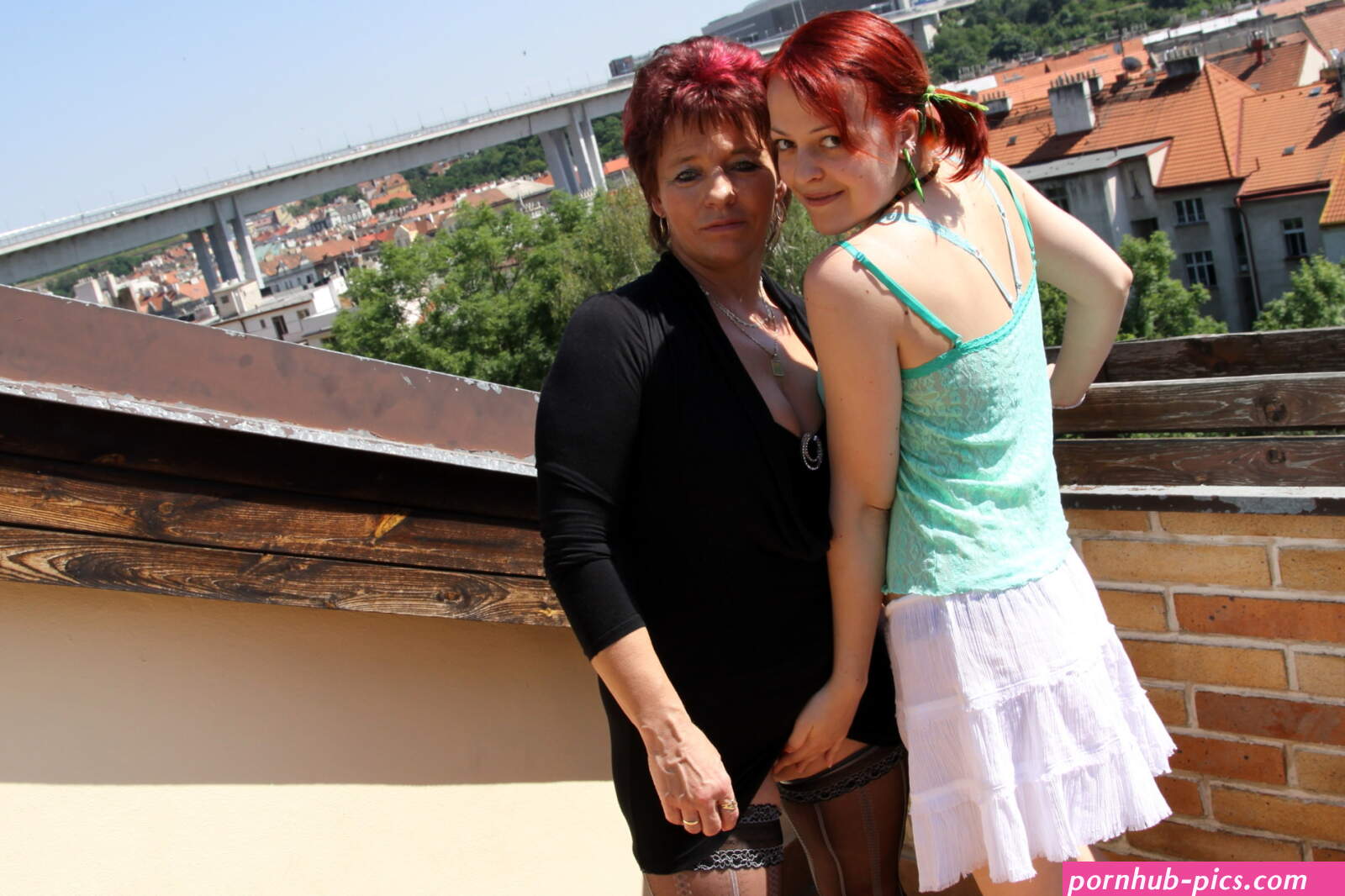 Mature lesbian lady and teen lesbian muffdiving and fucking each other with strapon