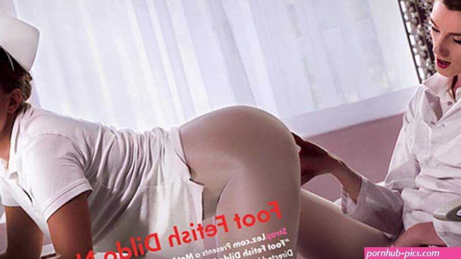 Sexy fetish nurse fucks her colleague with a squirting dildo